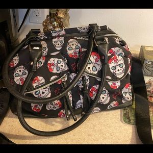 Betsey Johnson skull duffle bag, great condition